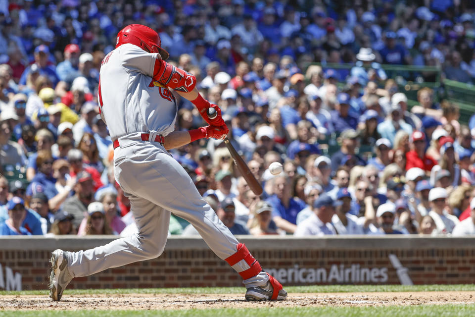 St. Louis Cardinals' Lars Nootbaar hits an RBI-double against the Chicago Cubs during the second inning of a baseball game, Friday, June 3, 2022, in Chicago. (AP Photo/Kamil Krzaczynski)