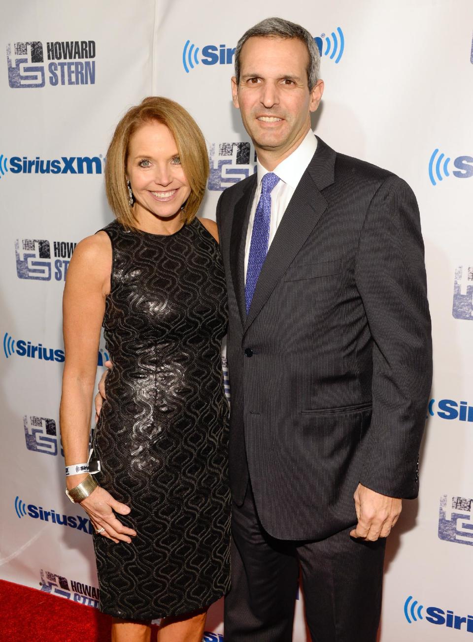 Talk show host Katie Couric and boyfriend John Molner attend "Howard Stern's Birthday Bash," presented by SiriusXM, at the Hammerstein Ballroom on Friday, Jan. 31, 2014, in New York. (Photo by Evan Agostini/Invision/AP)