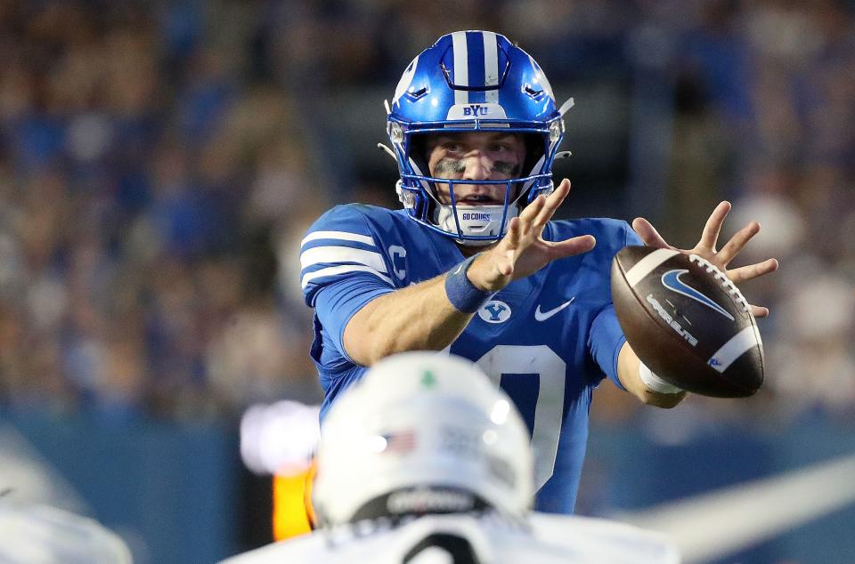 Brigham Young Cougars quarterback Kedon Slovis (10) catches a snap during a football game against the Cincinnati Bearcats at LaVell Edwards Stadium in Provo on Friday, Sept. 29, 2023. BYU won 35-27. | Kristin Murphy, Deseret News