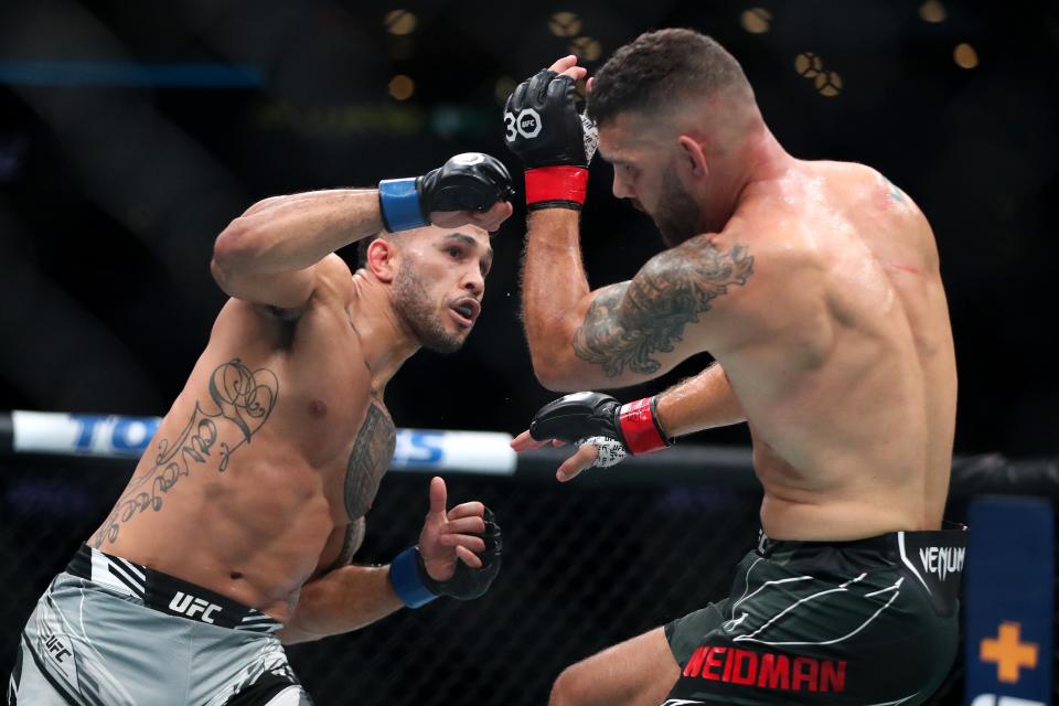 Brad Tavares, left, beat Chris Weidman, who returned after a two-year absence caused by a broken leg (Getty Images)