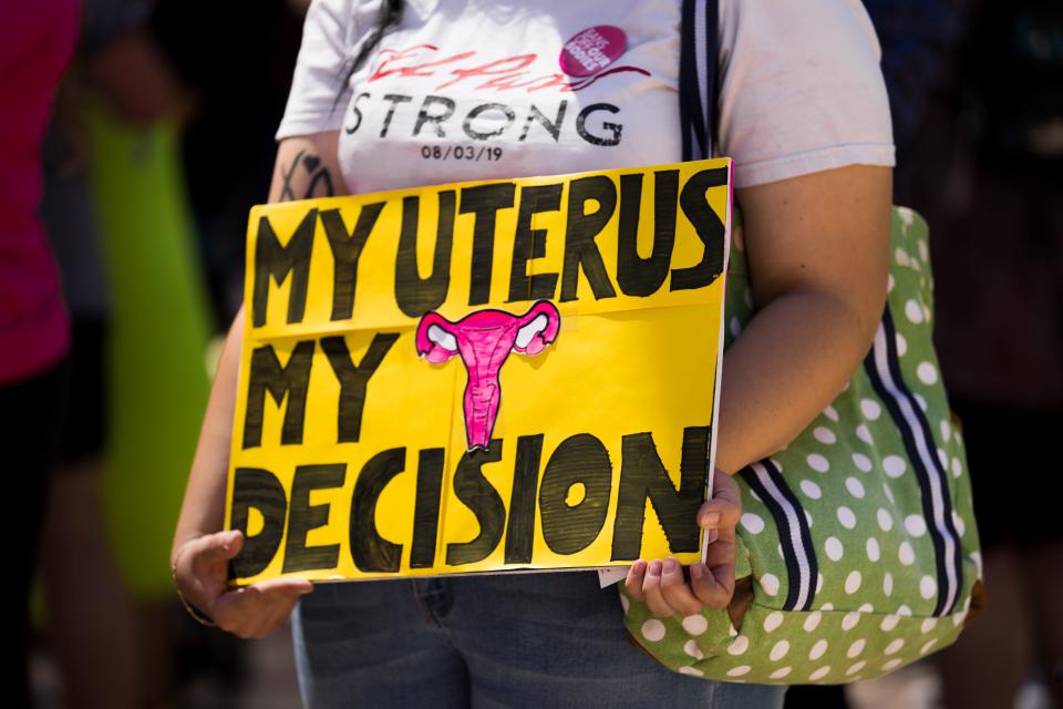 Abortion advocates joined the El Paso County Democratic Party on a march in Downtown El Paso to demand affordable healthcare, including abortion.