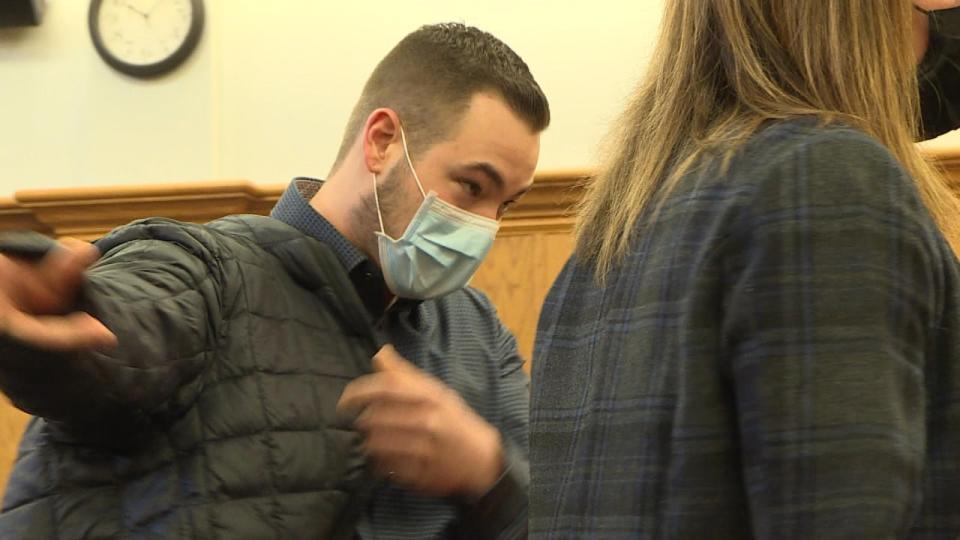 Nicholas Villeneuve leaves a courtroom in Gander's Provincial Court after being acquitted in February 2021.  (Garrett Barry/CBC - image credit)