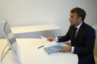 French President Emmanuel Macron attends a donor teleconference with other world leaders, in Bormes-les-Mimosas