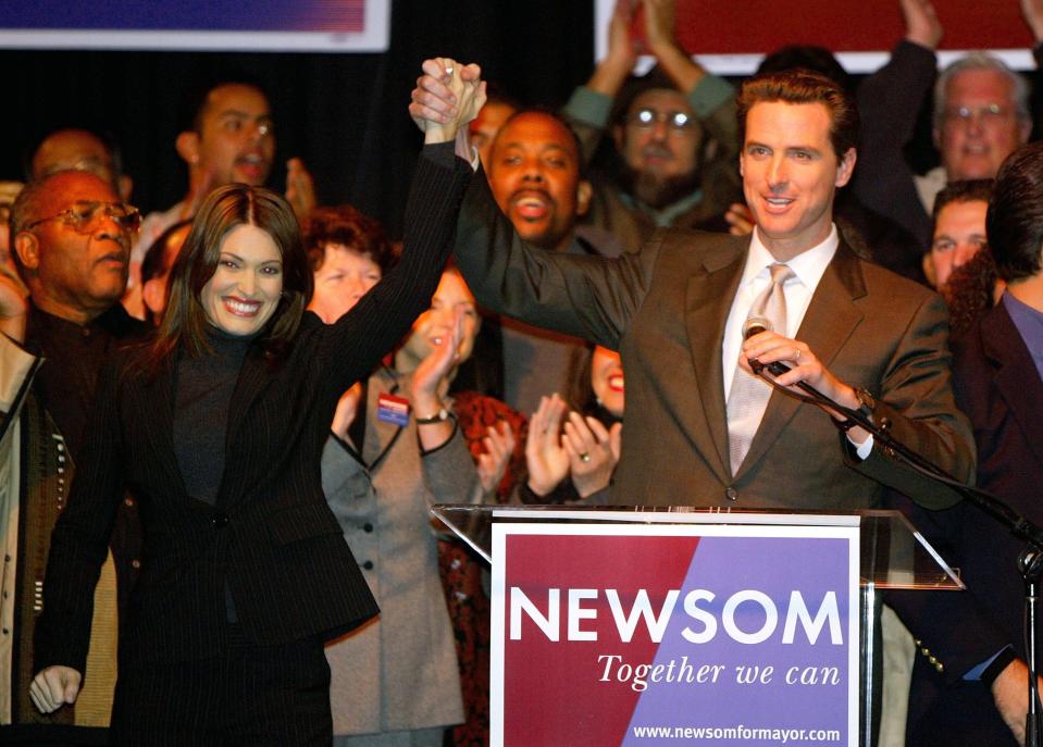 Gavin Newsom and Kimberly Guilfoyle on election night in 2003