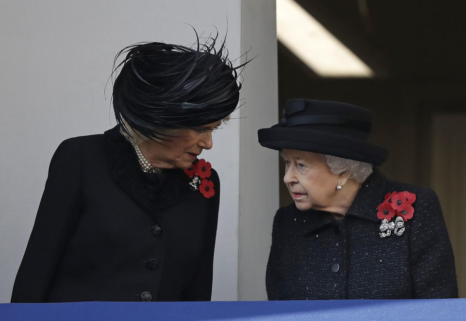 Britain's Queen Elizabeth II and Camilla, Duchess of Cornwall, speak as they attend the Remembrance Sunday ceremony at the Cenotaph in Whitehall in London, Sunday, Nov. 10, 2019. Remembrance Sunday is held each year to commemorate the service men and women who fought in past military conflicts. (AP Photo/Matt Dunham)