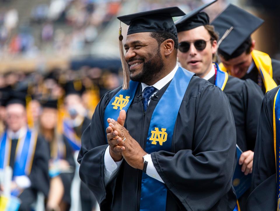 Jerome Bettis claps during the Notre Dame Commencement ceremony Sunday, May 15, 2022 at Notre Dame Stadium in South Bend. 