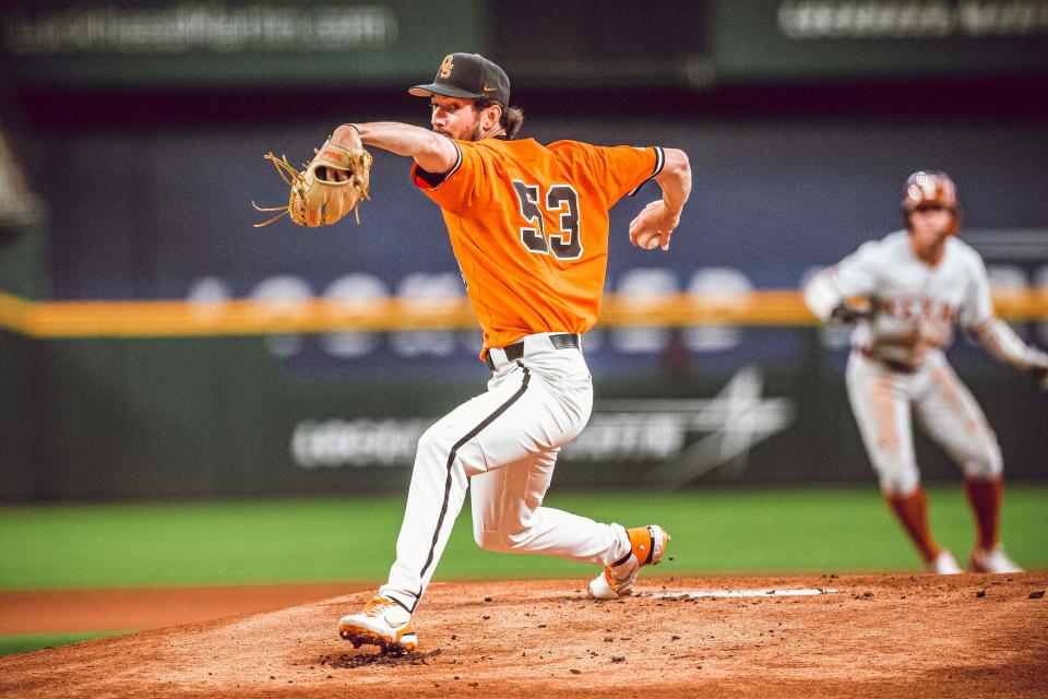 OSU pitcher Ryan Bogusz (53) allowed only one run and five hits in eight innings to lead the Cowboys to an 8-1 win against Texas in the first elimination game Saturday at Globe Life Field in Arlington, Texas.