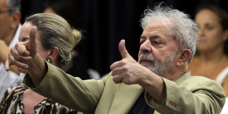 FILE PHOTO: Former Brazilian President Luiz Inacio Lula da Silva reacts at his book launch event in Sao Paulo, Brazil March 16, 2018.  REUTERS/Paulo Whitaker