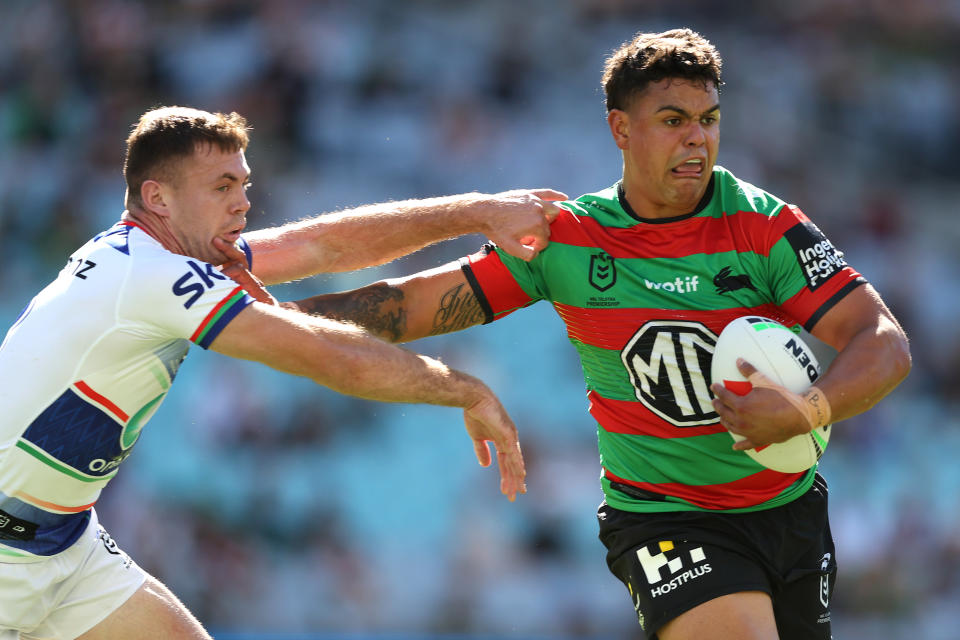 Latrell Mitchell runs the ball.