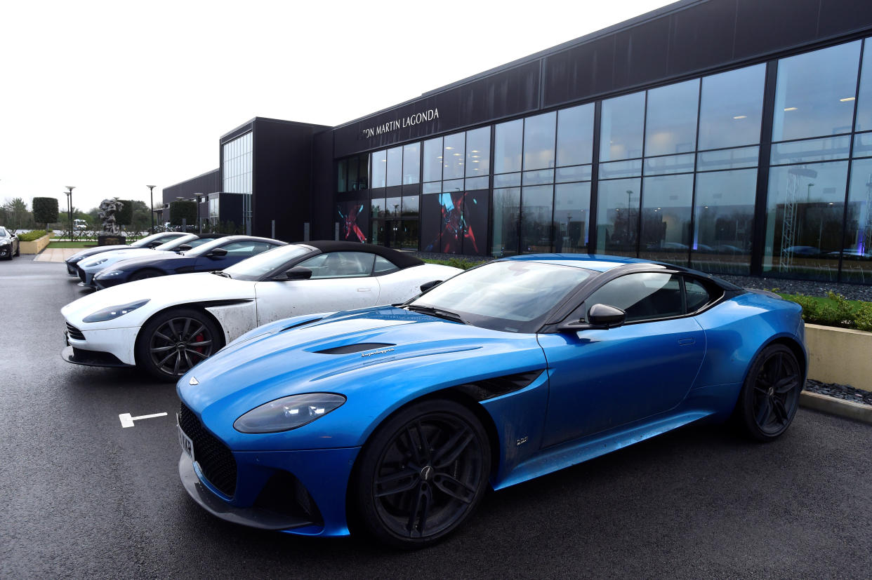 Aston Martin Lagonda cars are parked outside the new factory at Saint Athan, Wales, Britain December 6, 2019. REUTERS/Rebecca Naden