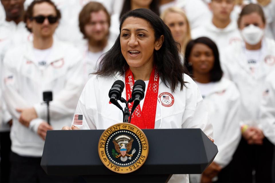Elana Meyers Taylor, 2022 Beijing Winter Olympics bobsledder, speaks on stage on the South Lawn of the White House in Washington, D.C., U.S., on Wednesday, May 4, 2022. Biden welcomed Team USA to celebrate their participation in the Tokyo 2020 Summer Olympic and Paralympic Games and Beijing 2022 Winter Olympic and Paralympic Games.