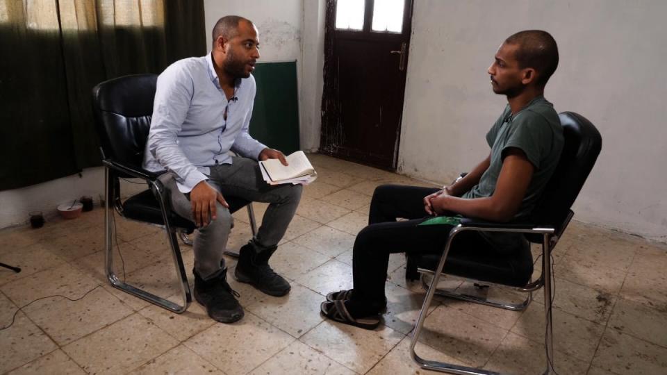 El Shafee Elsheikh (right) talking to ITV’s security editor Rohit Kachroo (ITV News/PA) (PA Media)