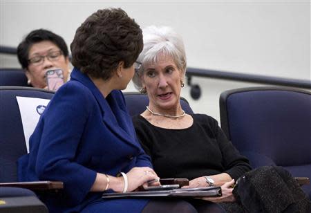 Kathleen Sebelius, Secretary of Health and Human Services, speaks with Valerie Jarrett, senior advisor to the President, before U.S. President Barack Obama delivers remarks about the Affordable Care Act at the White House in Washington December 3, 2013. REUTERS/Joshua Roberts