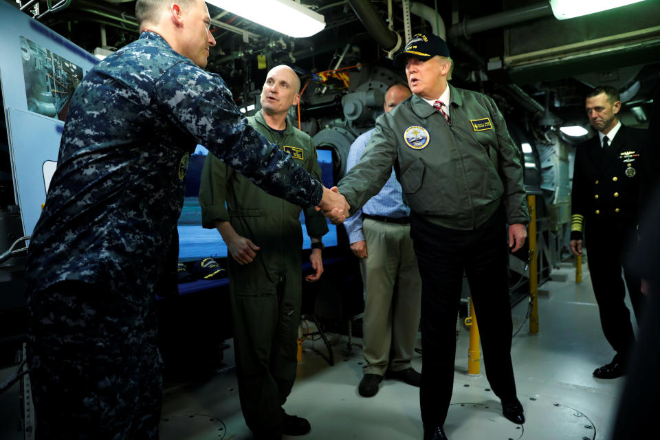 Trump tours the pre-commissioned U.S. Navy aircraft carrier Gerald R. Ford at Huntington Ingalls Newport News Shipbuilding facilities in Newport News, Virginia, on&nbsp;March 2, 2017.