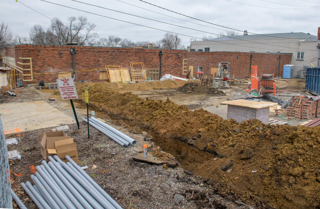 Work is in full swing behind the new Prospect Mall development in Peoria Heights.