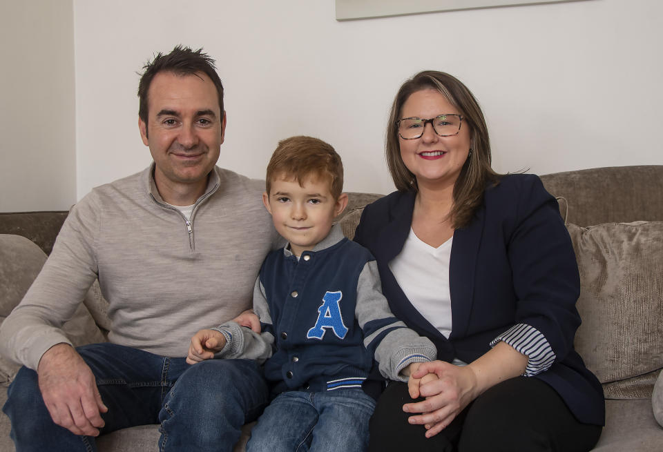 Owen Everitt with his parents Rob and Sarah (PA)