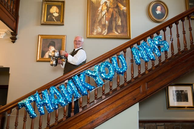 Night manager Tam Main helps prepare refreshments for the special guests at the Loch Fyne Hotel and Spa in Inveraray 