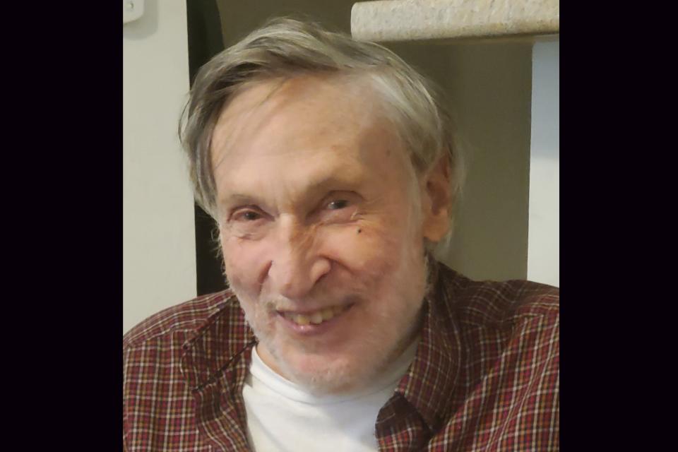 In this photo provided by Ed Smith, Geoffrey Holt smiles on Sept. 12, 2022. Holt left the town of Hinsdale, N.H., nearly $4 million when he died last June. (Ed Smith via AP)