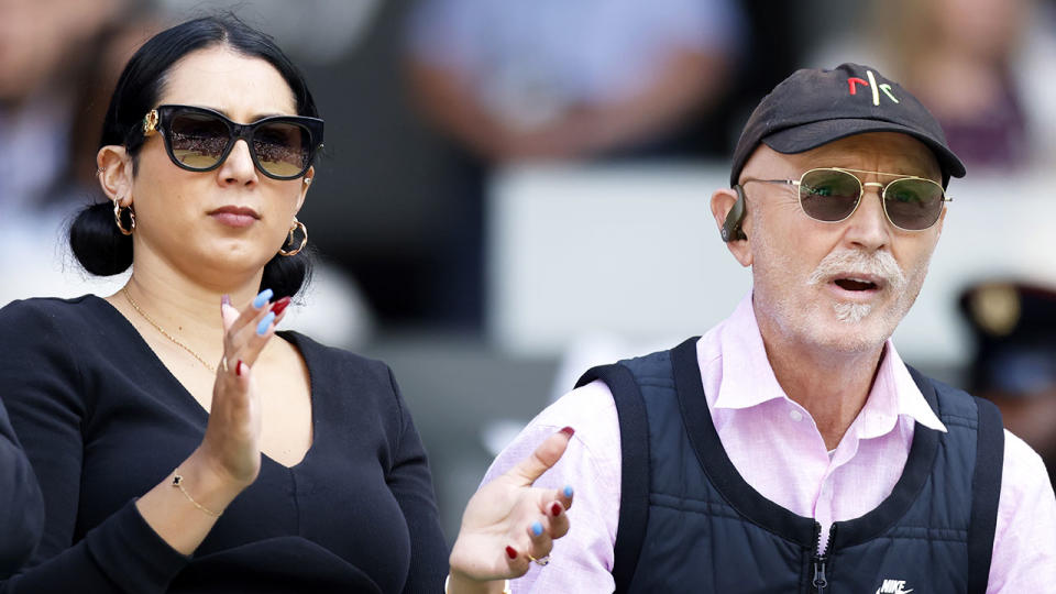 Pictured left to right, Nick Kyrgios' sister Halimah and father Giorgos watching a match at Wimbledon in 2022.