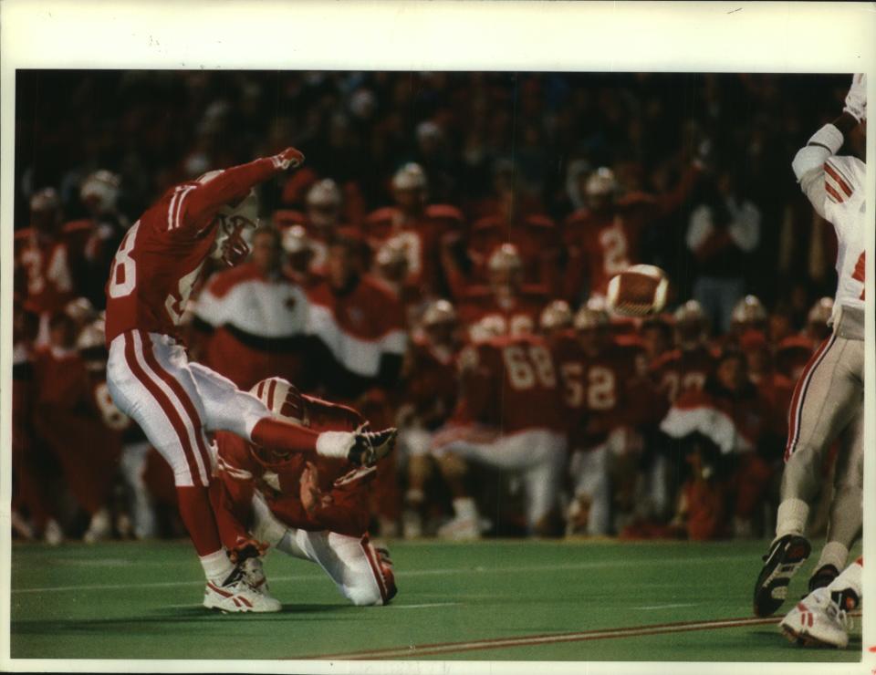 Rick Schnetzky follows through on a 33-yard field goal attempt in the waning seconds of Wisconsin's 14-14 tie with Ohio State in Madison in 1993. The kick was blocked.