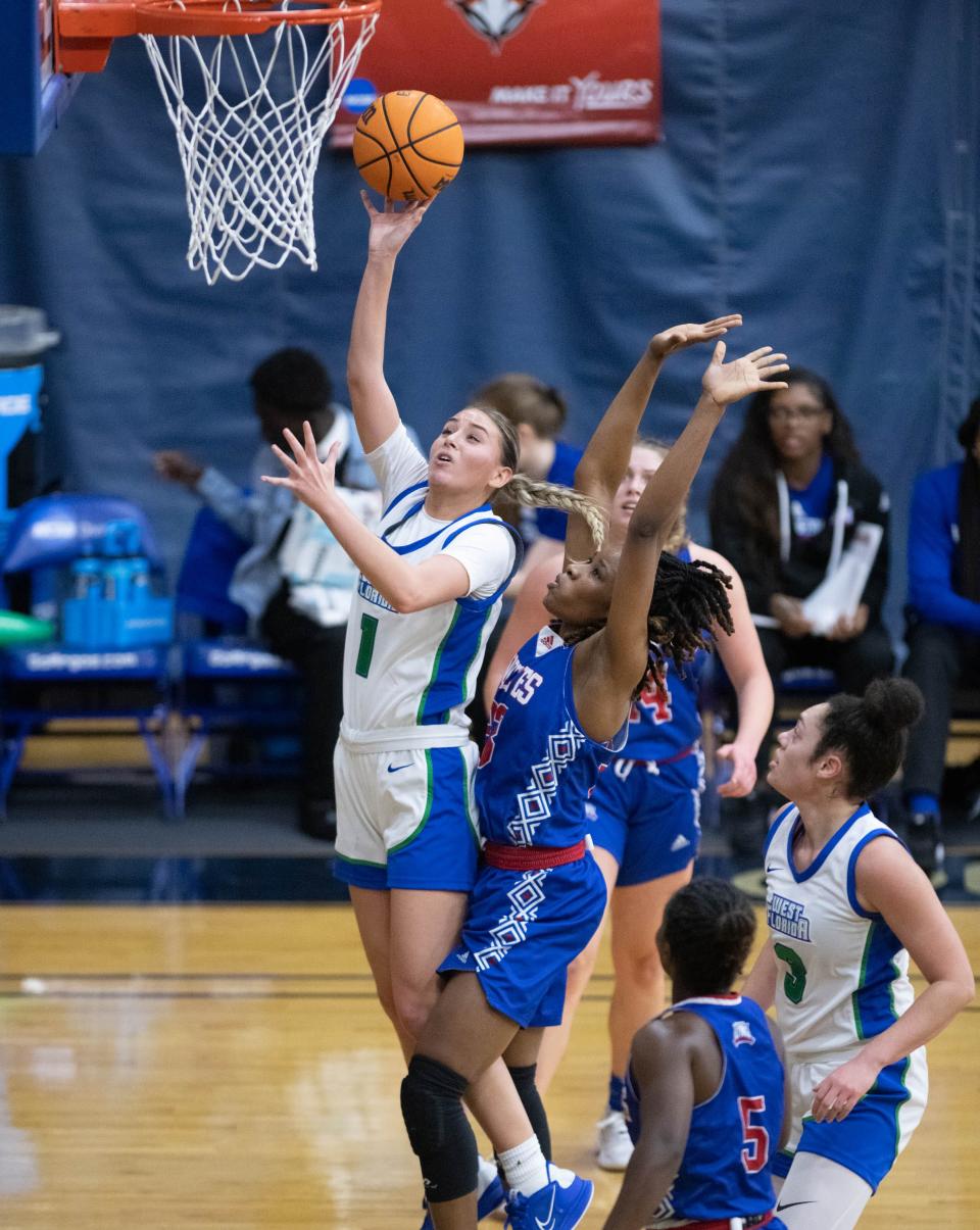 Jaclyn Jarnot (1) takes it to the hoop during the University of West Georgia vs University of West Florida women's basketball game at the University of West Florida in Pensacola on Wednesday, Jan. 25, 2023.