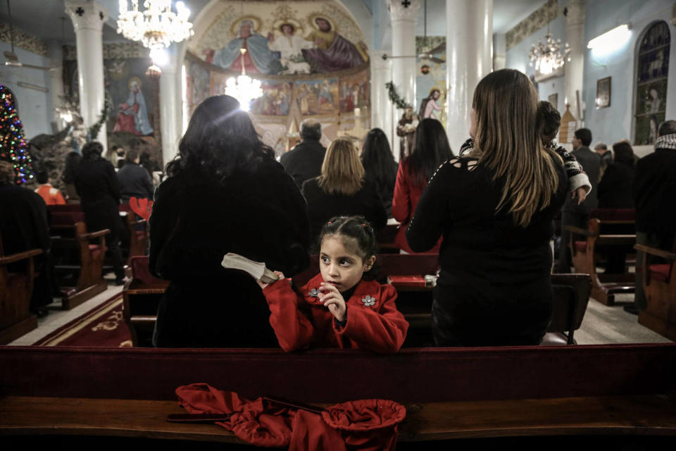 Palestinian Christians attend a Christmas Eve mass at the Holy Family Catholic Church in Gaza on December 24, 2016. (NurPhoto via Getty Images)