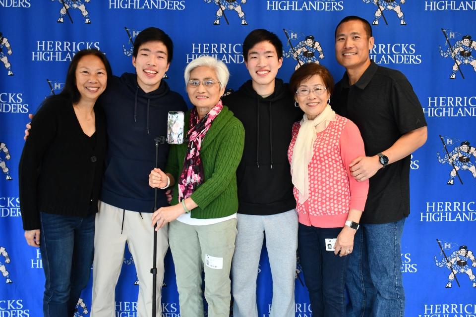 Left to right, Cecilia Lee, Devon Lee, Jeylin Lee on Facetime, Trudy Lee, Dylan Lee, Wendy Siu and Paul Lee. Devon and Dylan are graduating in June from Herricks High School and have been named valedictorian and salutatorian.