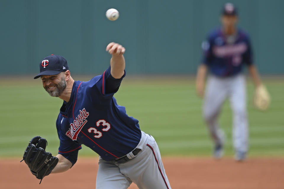Minnesota Twins starting pitcher J.A. Happ (33) delivers in the first inning of a baseball game against the Cleveland Indians, Wednesday, April 28, 2021, in Cleveland. (AP Photo/David Dermer)