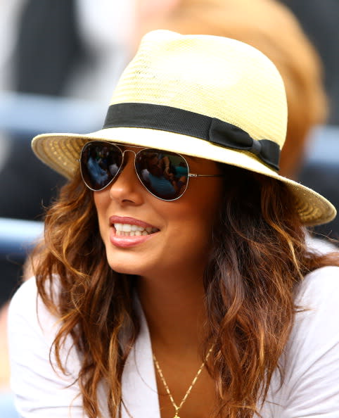 Actress Eva Longoria looks on as Serena Williams of the United States plays against Andrea Hlavackova of Czech Republic during their women's singles fourth round match on Day Eight of the 2012 US Open at USTA Billie Jean King National Tennis Center on September 3, 2012 in the Flushing neighborhood of the Queens borough of New York City. (Photo by Al Bello/Getty Images)