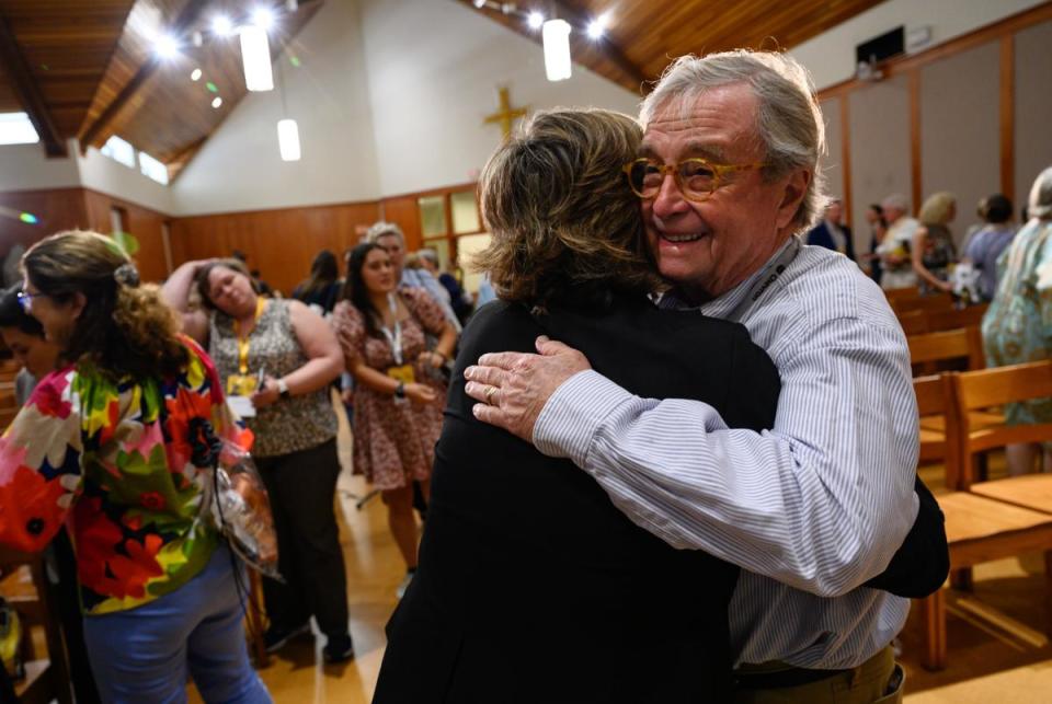 Dick DeGuerin, former prosecuting attorney for the impeachment trial of Attorney General Ken Paxton, embraces General Investigating Committee chair Rep. Ann Johnson, D-Houston, following her one on one panel at The Texas Tribune Festival Saturday, Sept. 23, 2023 in Austin, Texas.