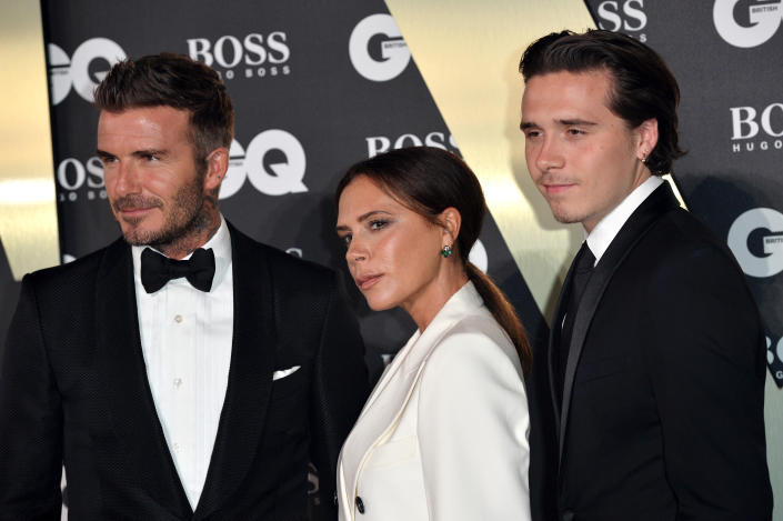 David Beckham, Victoria Beckham and their son Brooklyn Beckham 