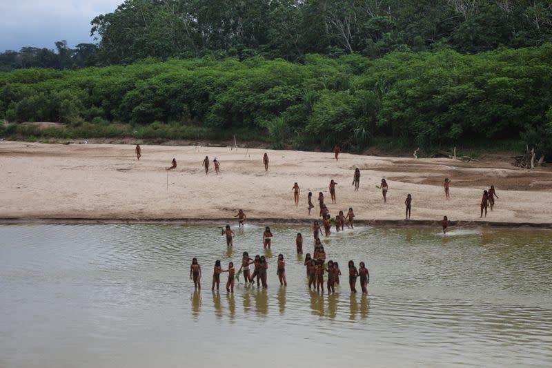 Members of the reclusive Mashco Piro tribe are seen near Monte Salvado