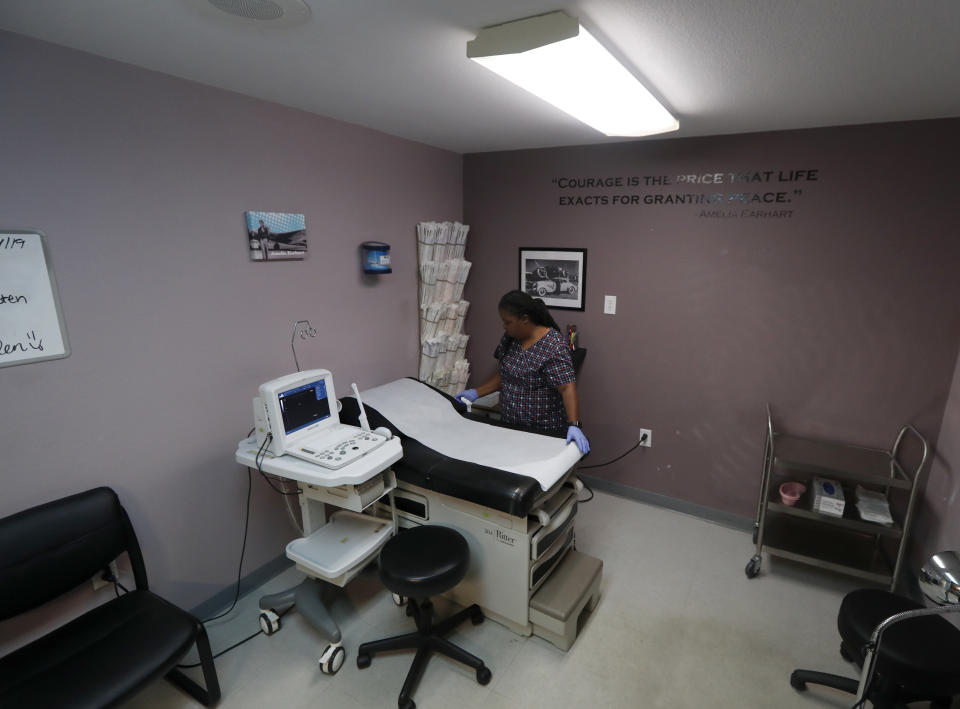 Director of Clinical Services, Marva Sadler, prepares the operating room at the Whole Woman's Health clinic in Fort Worth, Texas, Wednesday, Sept. 4, 2019. (AP Photo/Tony Gutierrez)