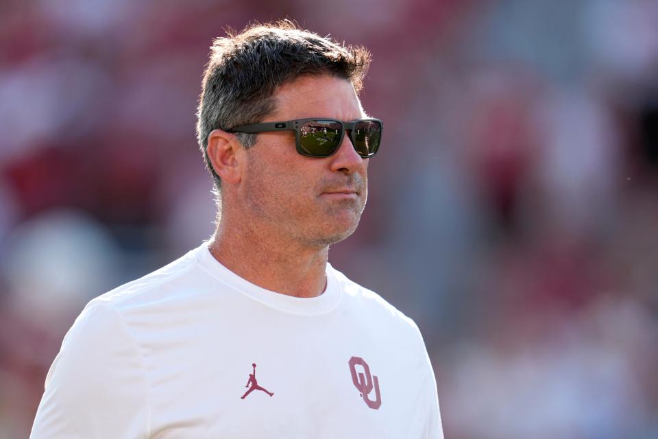 Oklahoma offensive coordinator Seth Littrell walks on the field before a college football game between the University of Oklahoma Sooners (OU) and the Houston Cougars at Gaylord Family Ð Oklahoma Memorial Stadium in Norman, Okla., Saturday, Sept. 7, 2024.