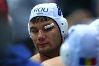 LONDON, ENGLAND - JULY 29: Mihnea Chioveanu of Romania looks on in the Men's Water Polo Preliminary Round Group B match between Great Britain and Romania on Day 2 of the London 2012 Olympic Games at Water Polo Arena on July 29, 2012 in London, England. (Photo by Alexander Hassenstein/Getty Images)