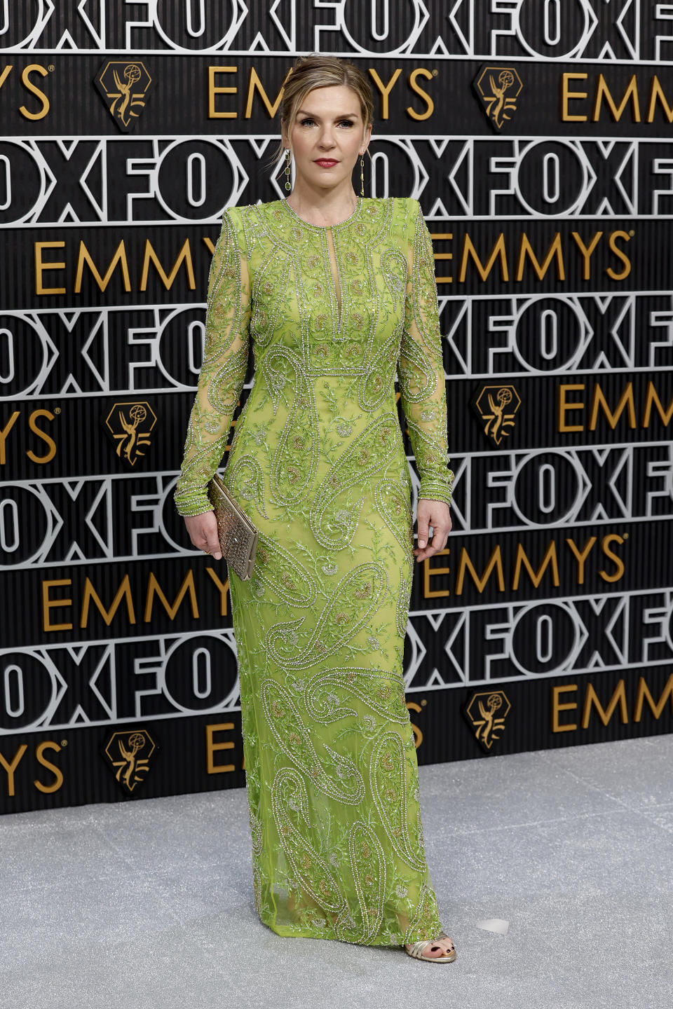 Rhea Seehorn in a long-sleeve green gown  at the 2024 Emmys. (Image via Getty Images)