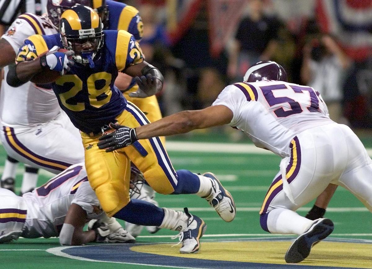 Marshall Faulk Los Angeles Rams Unsigned Running Photograph