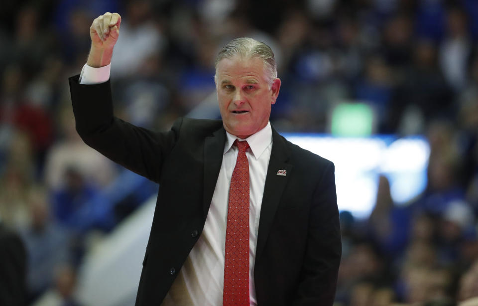 San Diego State head coach Brian Dutcher signals to his players in the second half of an NCAA college basketball game against Air Force, Saturday, Feb. 8, 2020, at Air Force Academy, Colo. (AP Photo/David Zalubowski)