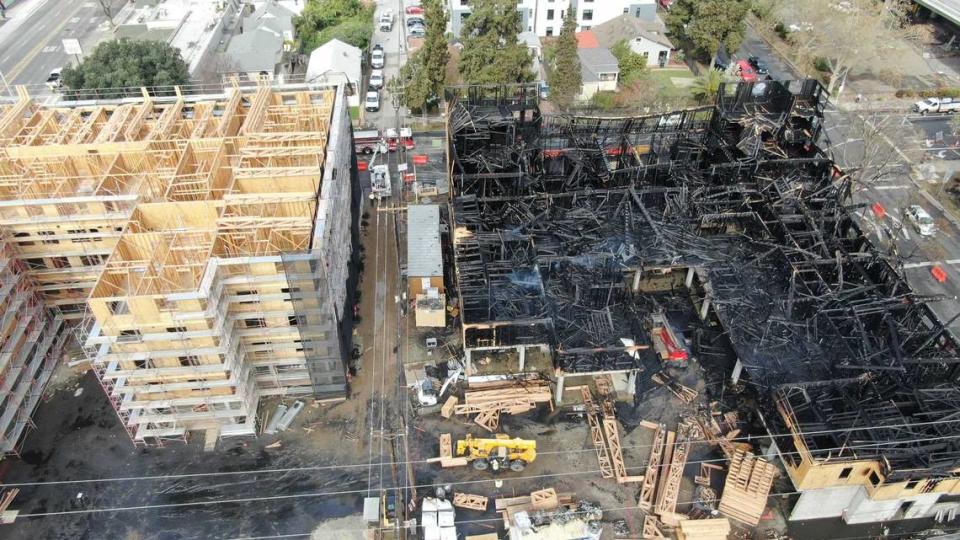 An aerial view from a drone shows the destruction to a five-story building under construction on 19th and X streets in Sacramento following a fire on Tuesday, March, 26, 2024. The three-alarm fire destroyed one of two affordable apartment complexes being built in the Broadway corridor.