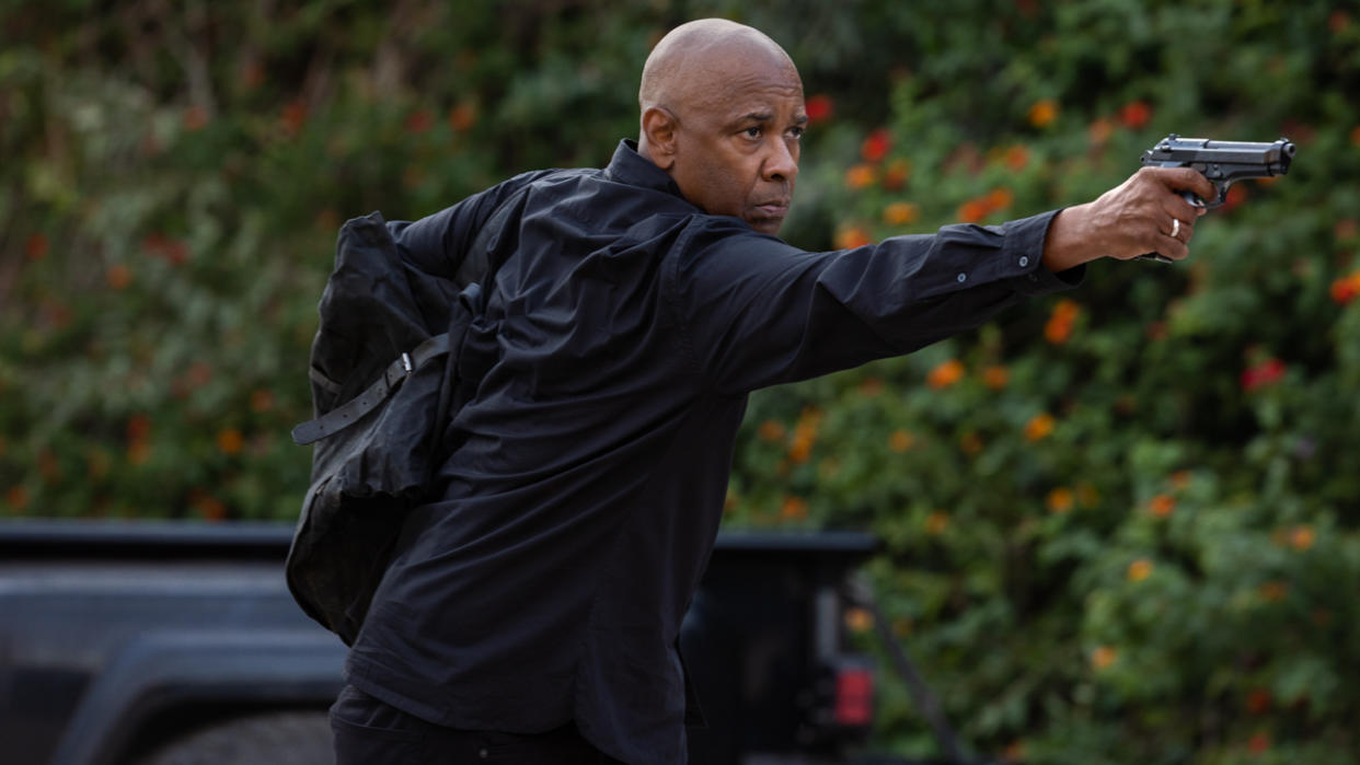  Denzel Washington shooting a gun in The Equalizer 3 