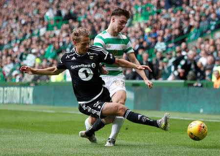 Soccer Football - Champions League - Celtic vs Rosenborg BK - Third Qualifying Round First Leg - Glasgow, Britain - July 26, 2017 Rosenborg's Vegar Eggen Hedenstad in action with Celtic's Kieran Tierney REUTERS/Russell Cheyne