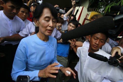 Myanmar opposition leader Aung San Suu Kyi in Yangon on April 22. Myanmar's parliament reopened with Suu Kyi refusing to take a seat on Monday, while the nation's president vowed "no U-turn" on reforms as the EU prepares to suspend sanctions