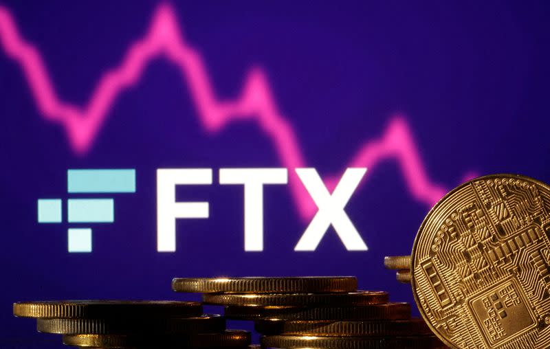 FILE PHOTO: Illustration shows FTX logo, stock graph and representation of cryptocurrencies