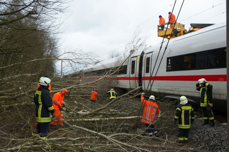 Hundreds of rail staff worked through the night to clear the tracks of branches and trees and to repair damage to the lines