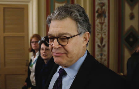 FILE PHOTO: U.S. Senator Al Franken (D-MN) arrives at the U.S. Senate to announce his resignation over allegatons of sexual misconduct on Capitol Hill in Washington, U.S. December 7, 2017. REUTERS/Aaron P. Bernstein