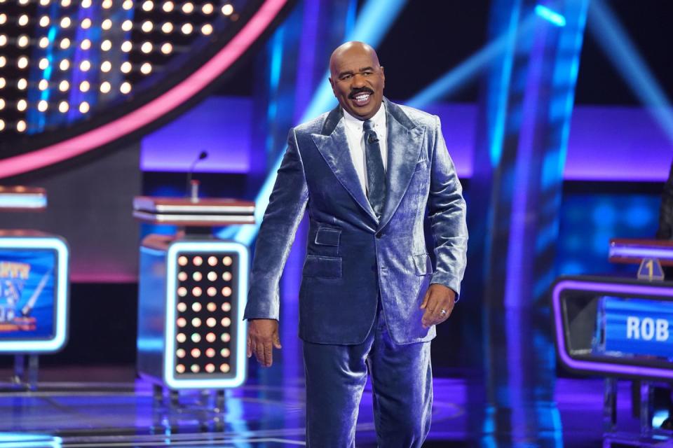 <p>Steve Harvey is the face of <em>Family Feud </em>and former contestant Libbi Sheridan revealed he's just as pleasant as you'd expect. "[Filming] takes a long time because Steve Harvey likes to meet everybody and get to know them and have conversation and be funny,” <a href="https://wach.com/news/local/a-behind-the-scenes-look-at-family-feud" rel="nofollow noopener" target="_blank" data-ylk="slk:she told local outlet Fox 57;elm:context_link;itc:0;sec:content-canvas" class="link ">she told local outlet Fox 57</a>.</p>