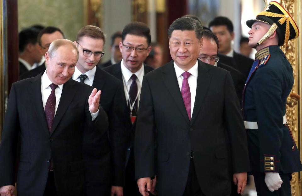 Russian President Vladimir Putin, left, and Chinese President Xi Jinping during their meeting in the Kremlin in Moscow, Russia, Wednesday, June 5, 2019. Chinese President Xi Jinping is on visit to Russia this week and is expected to attend Russia's main economic conference in St. Petersburg. (Maxim Shipenkov/Pool Photo via AP)