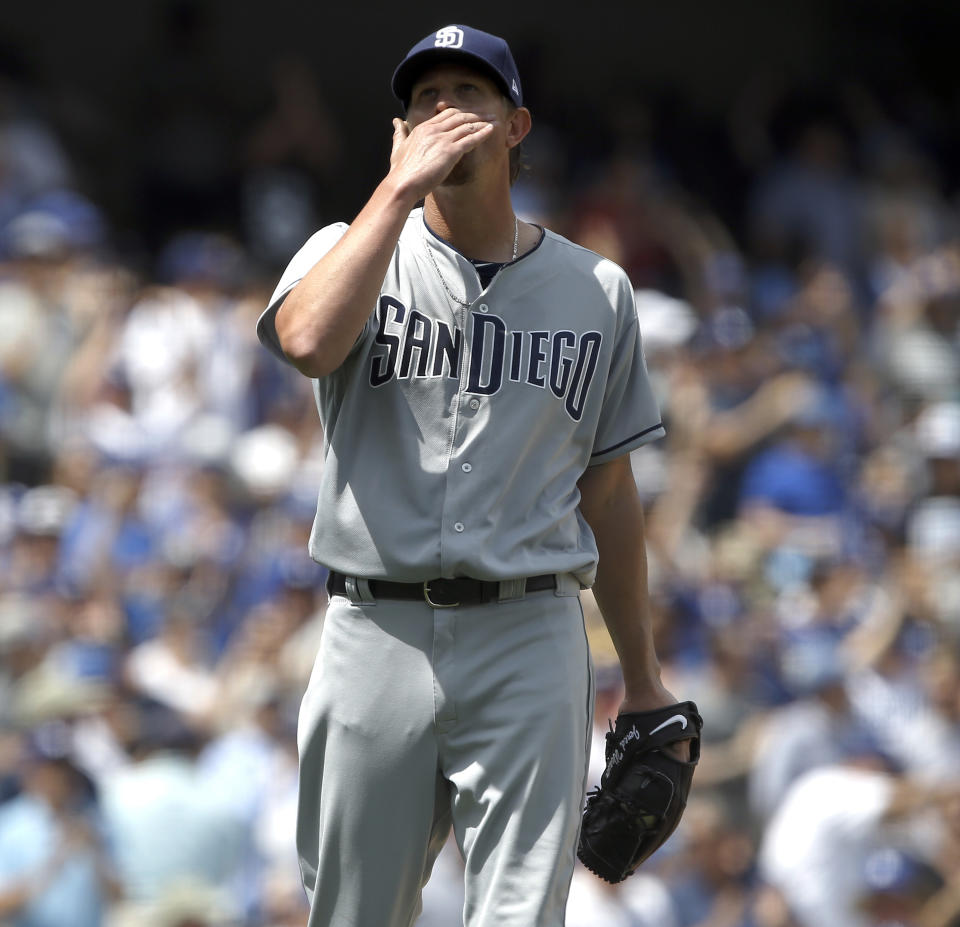 San Diego Padres pitcher Jered Weaver reacts after Los Angeles Dodgers' Yasiel Puig hits his second two-run home run, of the game, during the fourth inning of a baseball game in Los Angeles, Thursday, April 6, 2017. (AP Photo/Alex Gallardo)