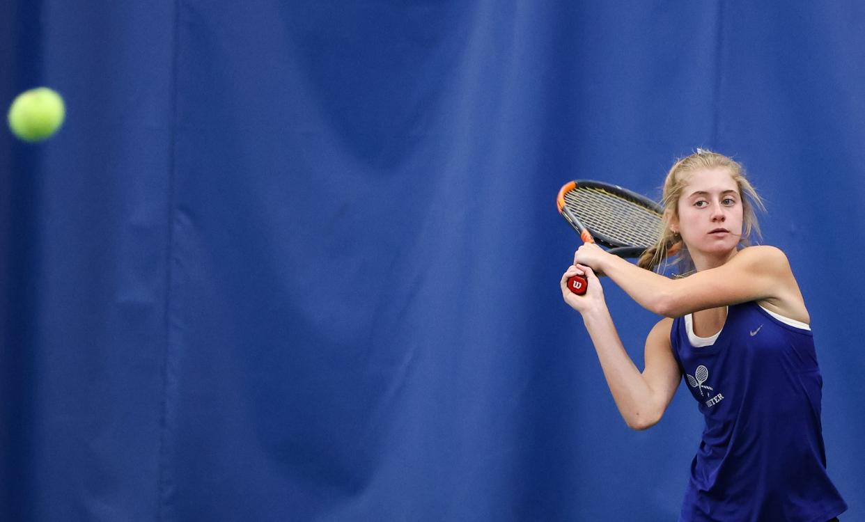 Wooster's Ava Mathur watches this backhand shot in her second round sectional battle.