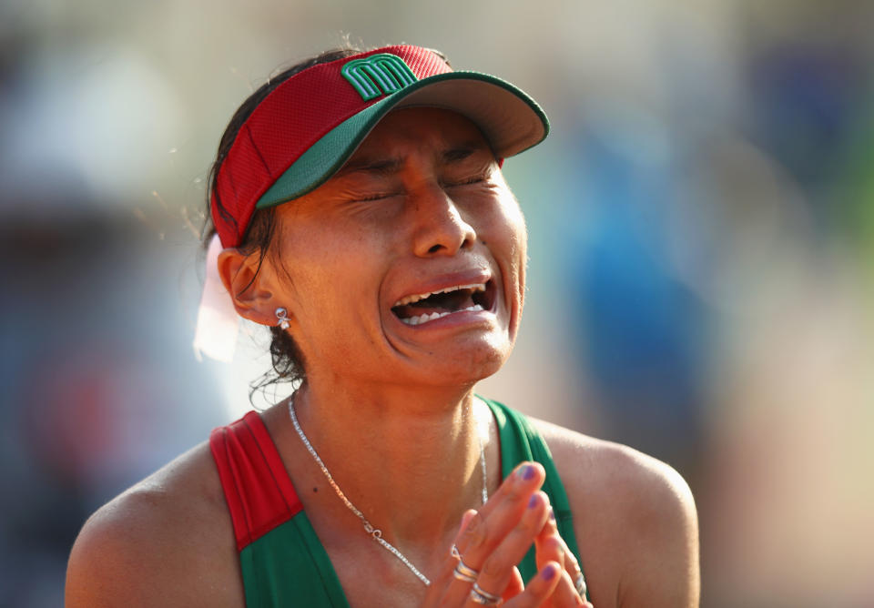 RIO DE JANEIRO, BRAZIL - AUGUST 19:  Maria Guadalupe Gonzalez of Mexico shows her emotions as she wins silver in the Women's 20km Walk final on Day 14 of the Rio 2016 Olympic Games at Pontal on August 19, 2016 in Rio de Janeiro, Brazil.  (Photo by Julian Finney/Getty Images)